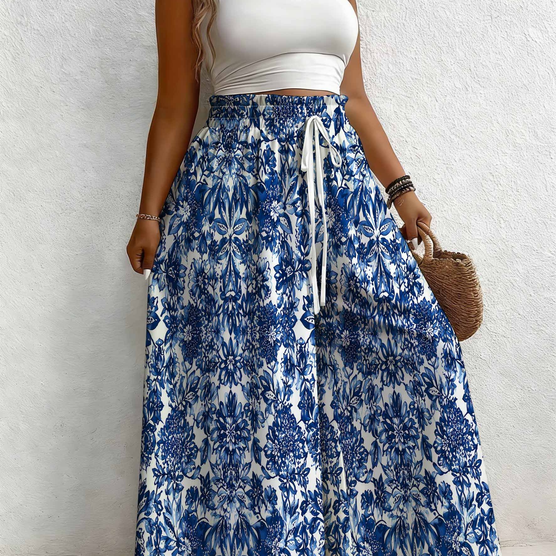 Image of Plus Size, Women's Plus Size Blue Floral Print Wideleg Pants. Vintage Bohemian Style. Artistic Chic Loose Fit. Drawstring Waist Design. Machine Washable. Suitable For Outdoor And Wear Relaxed Pants.