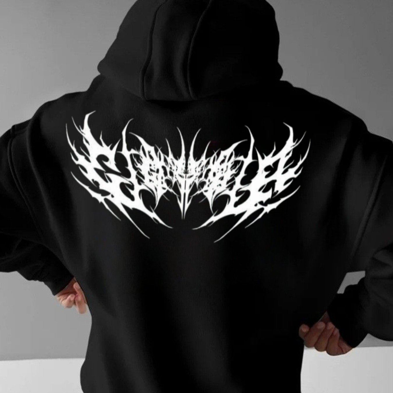 Image of Men's Black Hoodie With Design: A Comfortable And Stylish Autumn/winter Must-have For Music Festival Lovers, Expressing