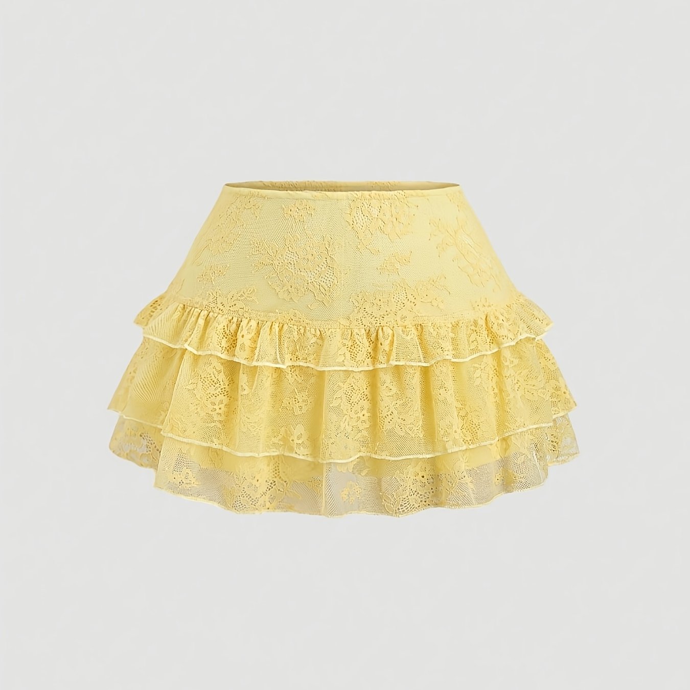 E-shop Diese Damenrockhose zeichnet sich durch ein einfarbiges Design aus, das mit geschichteten Spitzenakzenten verziert ist und einen eleganten und