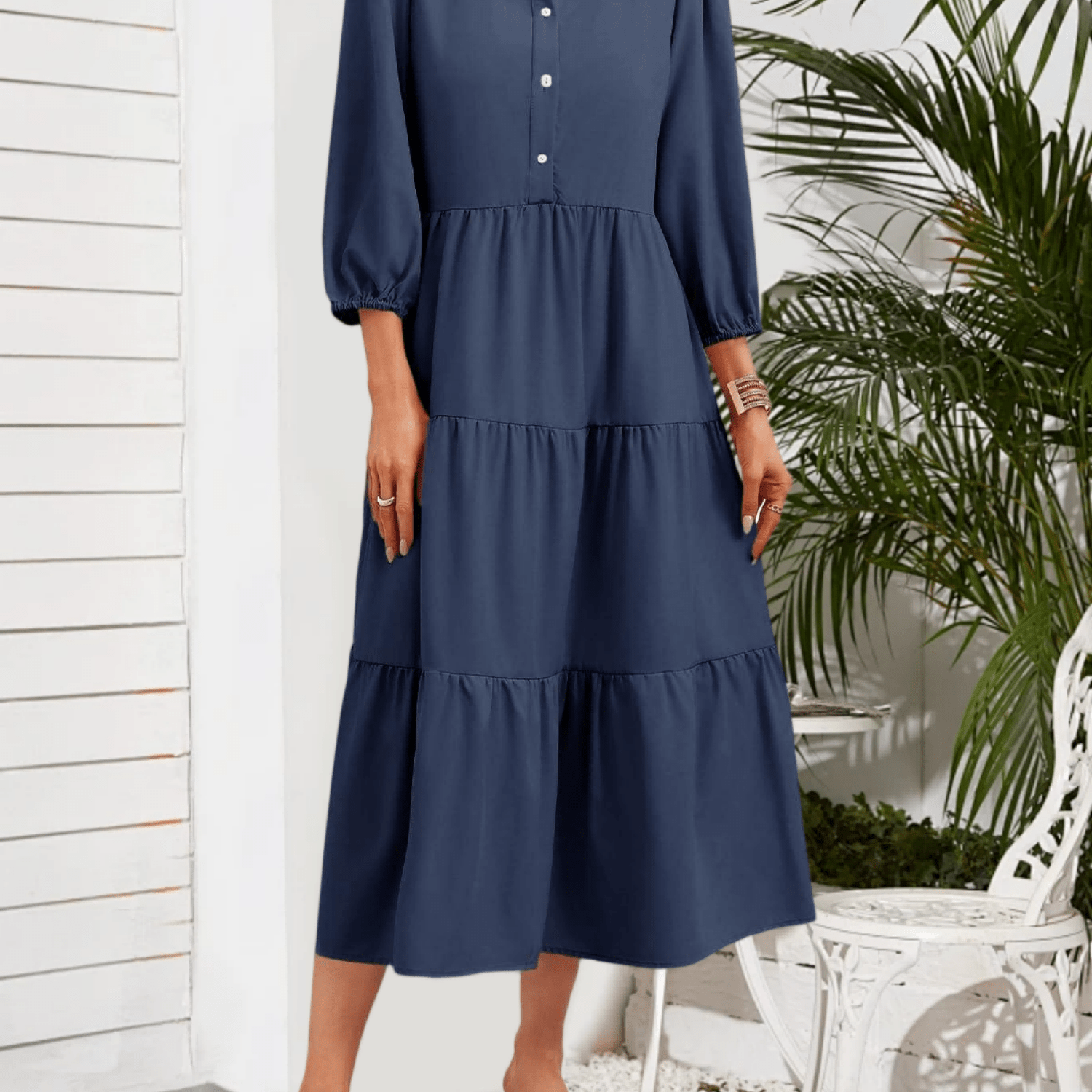 A Relaxed 3/4 Sleeve Button-up V-neck Collared Dress With A Flowing Tiered Maxi Design For Women
