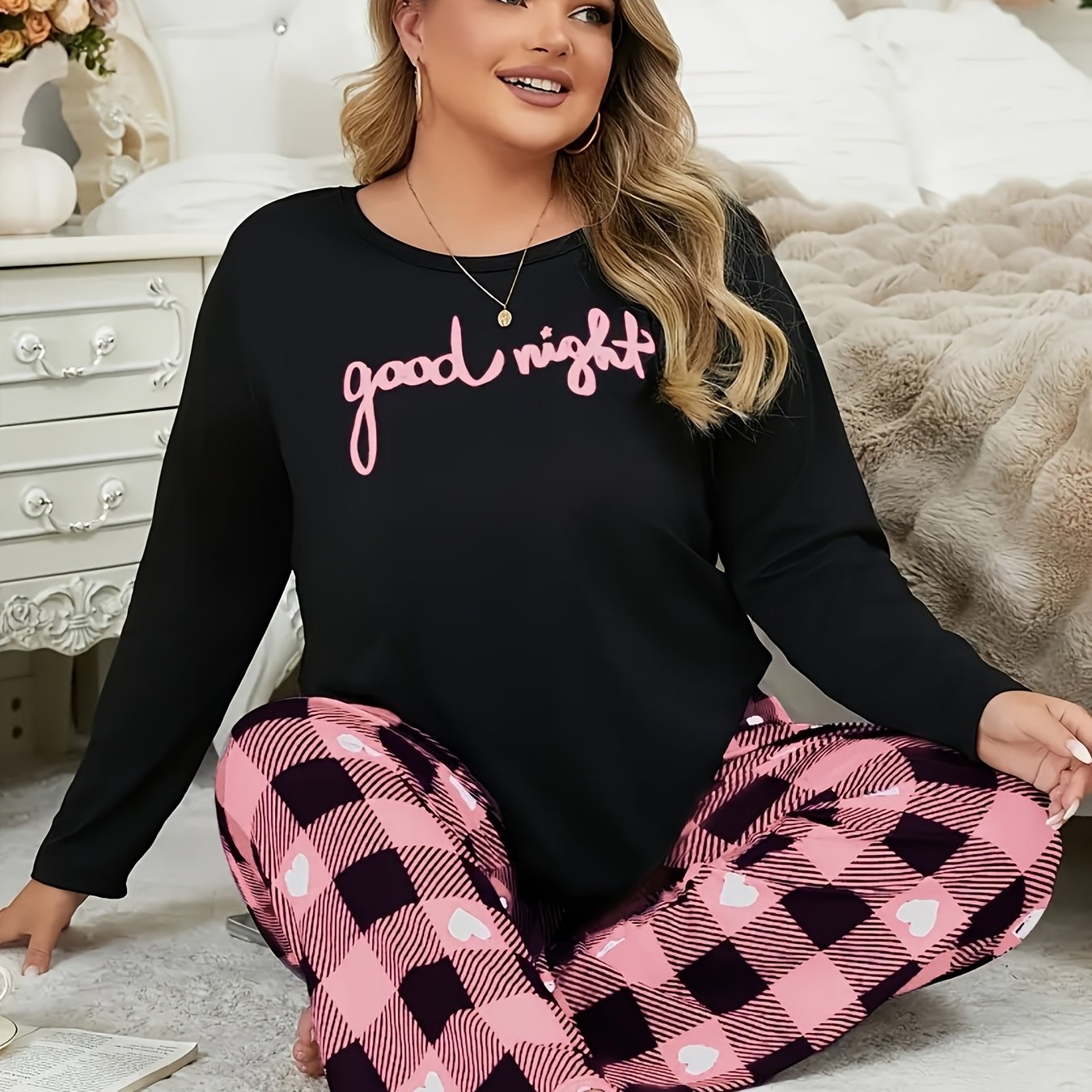 Image of A Pajama Set Featuring A Round-neck Long-sleeve Top With Letters And Heart-patterned Checkered Pants