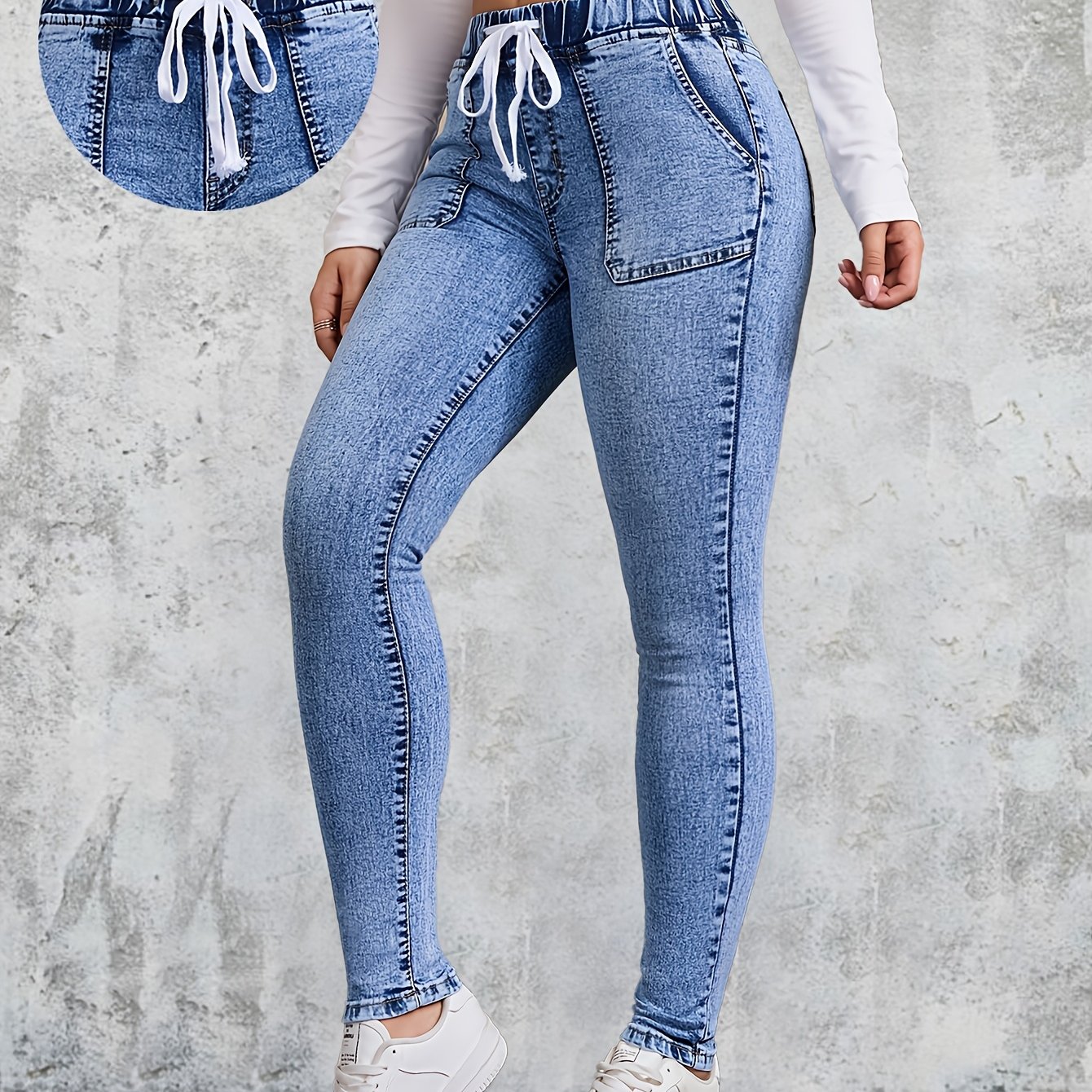 Image of Women's Washed Denim Long Pants With Drawstring, Stretch Elastic Waistband, Fashionable And Versatile, Blue Snowflake Print, Slim Fit, And Skinny Leg