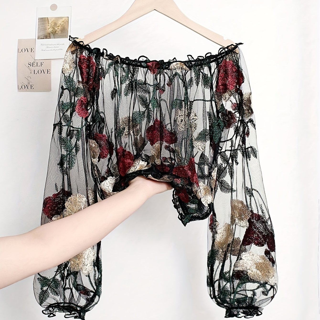 E-shop Herbst/Winter Damenmode Transparentes Mesh Häkelstickerei Blumen Off-Shoulder Laternenärmel Crop Top