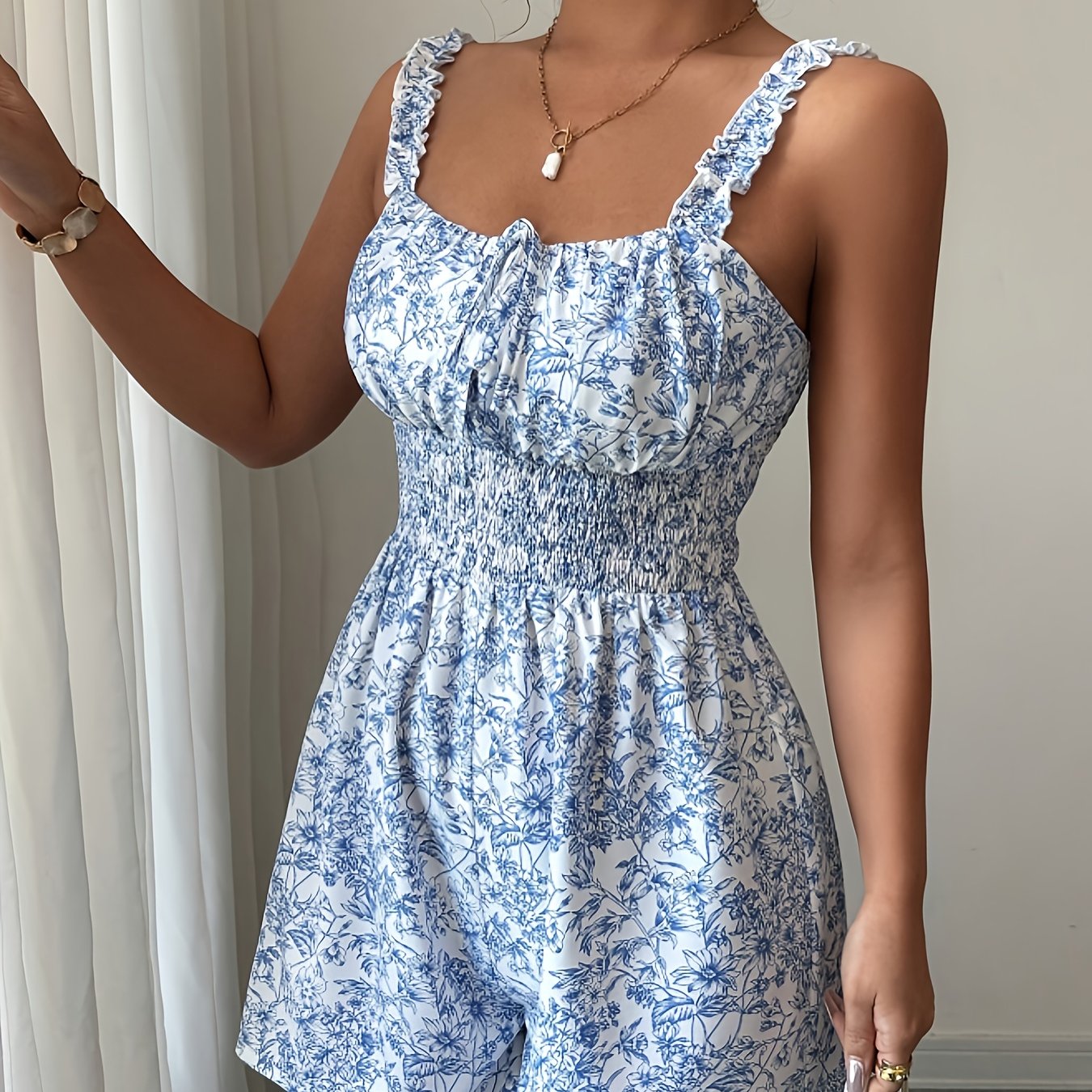 Image of Women's And White Floral Print Ruched Waist Slim-fit Jumpsuit With Ruffle Hem For Casual Vacation Wear