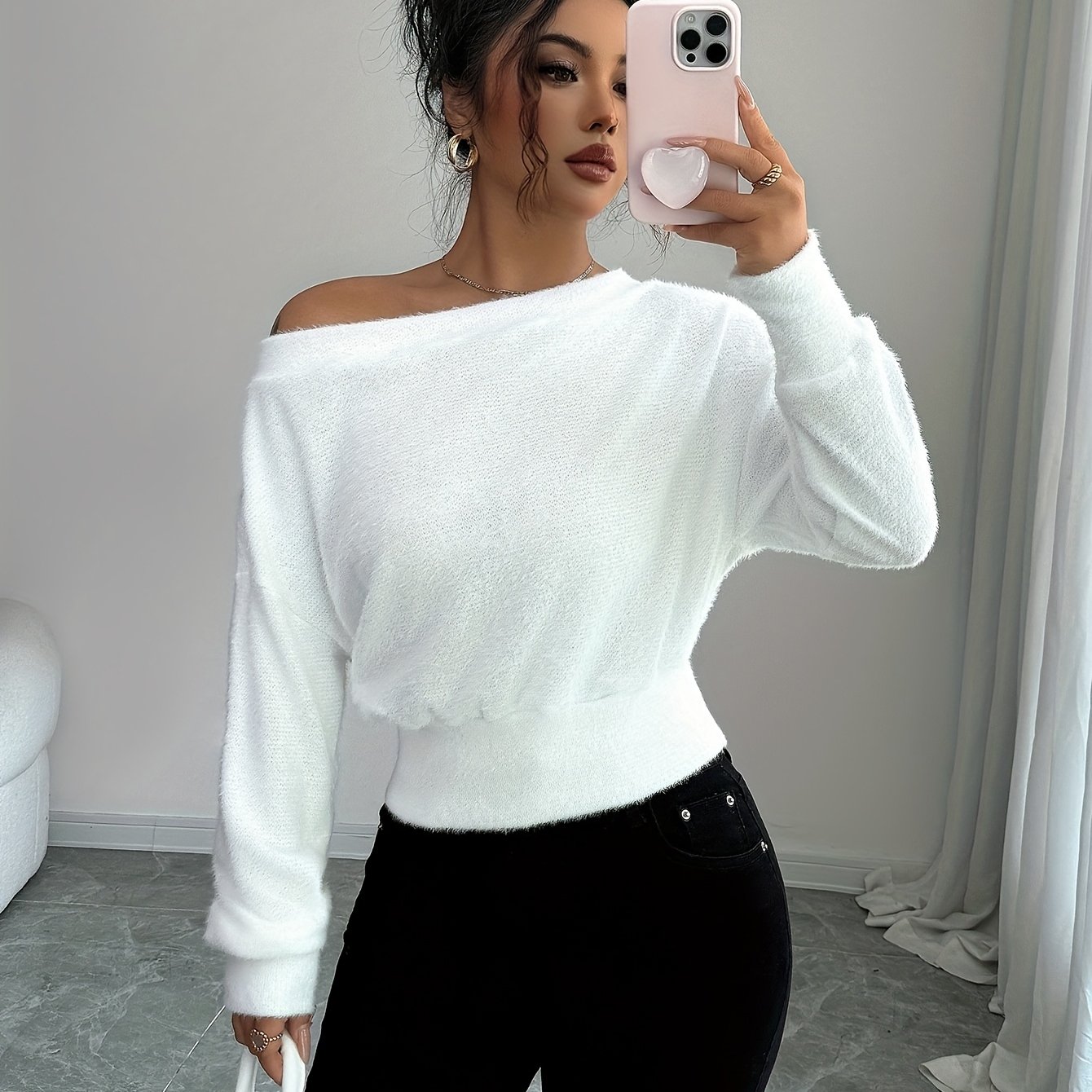 A Women's Winter Top With A Short Off-shoulder Design And Plush Fabric