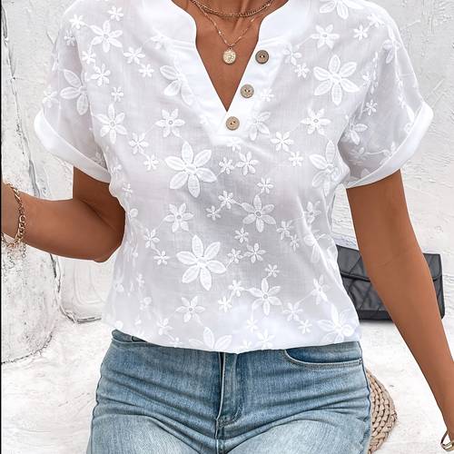 womens loose white shirt with a summer floral pattern and a v neck batwing sleeve design