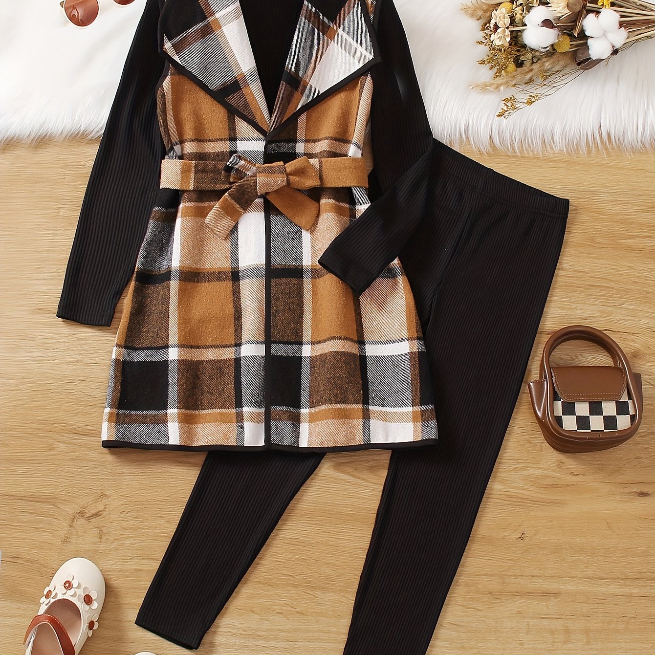 Girls' 3pcs Set: Lapel Front Tie Bow Vest + High-neck Knit Sweater + Slim-fit Long Pants Set For Spring/autumn. The Top Is A Black Long-sleeve Item, And Is 100% Polyester, Perfect For Outdoor
