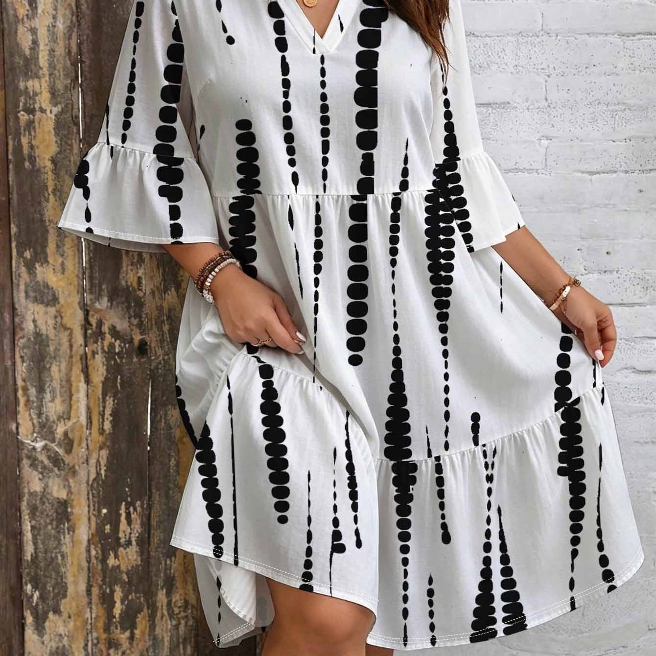 Image of Plus Size, Plus Size Vertical Dot Stripe Print Dress. Vnotch Neck. Bell Sleeves. Layered Skirt. Loose Fit. Monochrome Chic Elegant Casual Bohemian Style Beach Party Outfit.