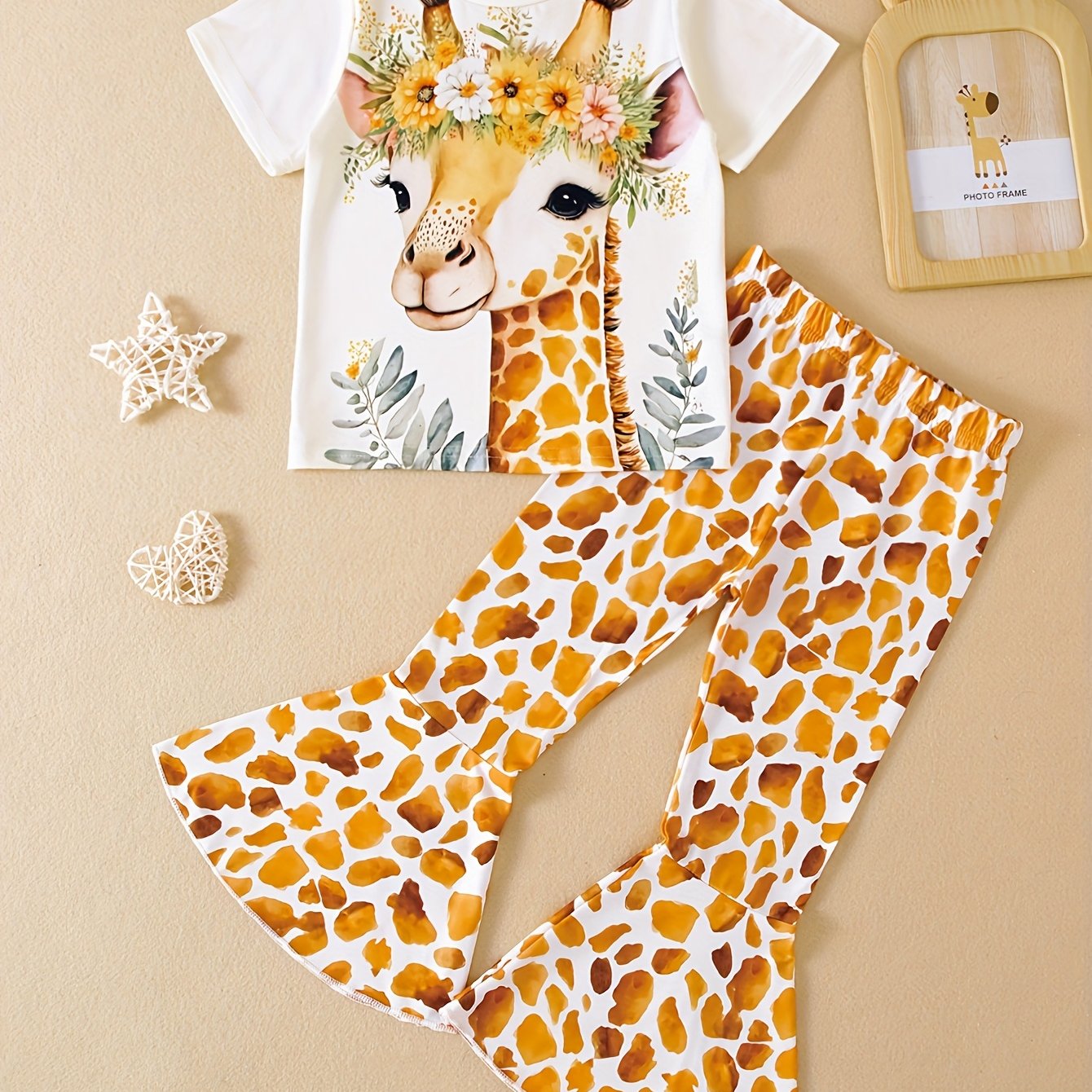 Image of A Two-piece Set For Girls Featuring A With A Soft And Comfortable Knit Fabric, Short-sleeved T-shirt With A 3d Giraffe Print, And Flared Pants, For Outdoor, Christmas, Halloween