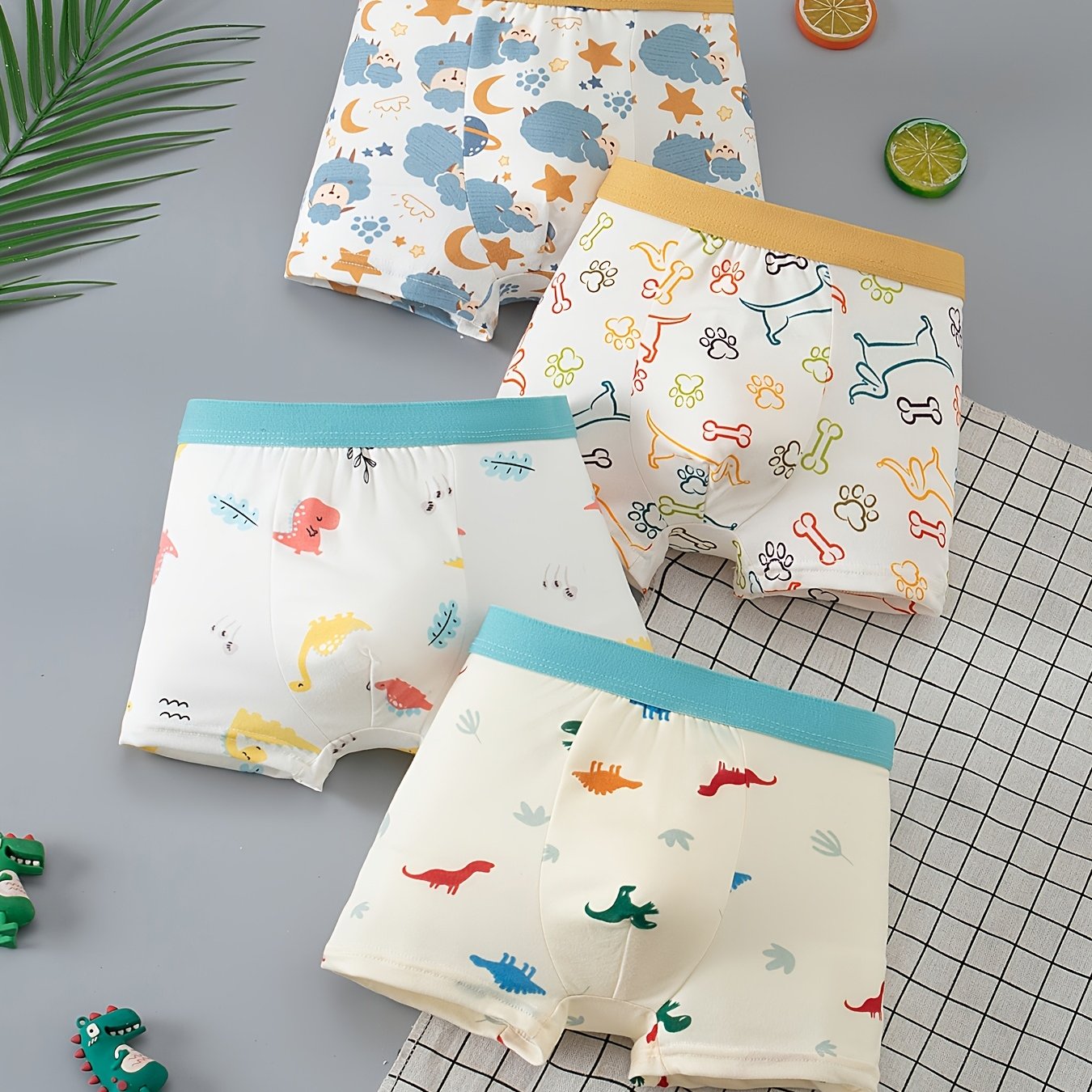 TEMU 4 piezas de ropa interior para niño para verano, tallas medianas a grandes, con estampados coloridos de dinosaurio, estrella, luna y cachorro,